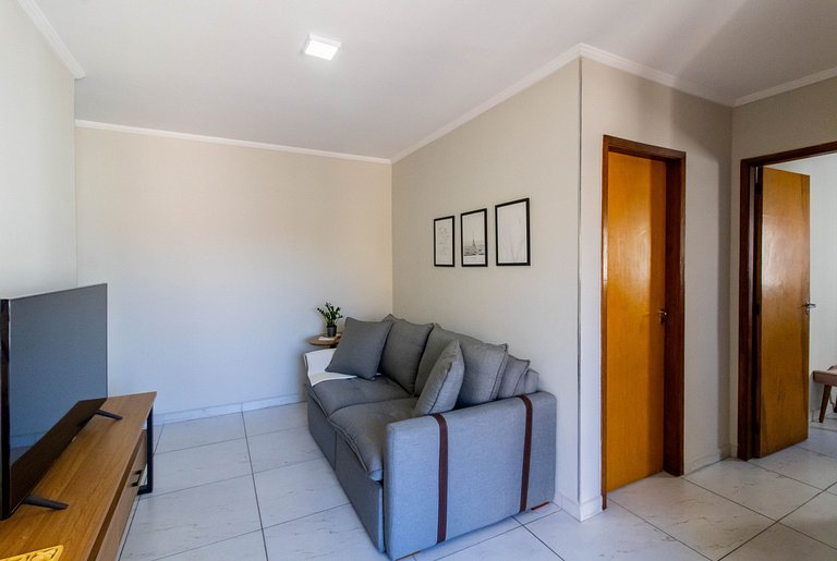 Apartamento aconchegante 0682 · 2 quartos + vaga · Shopping