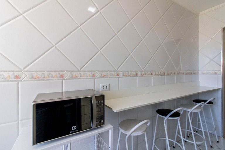 Apartamento aconchegante 0682 · 2 quartos + vaga · Shopping