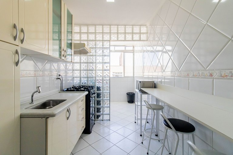 Apartamento aconchegante 0682 · 2 quartos + vaga · Shopping