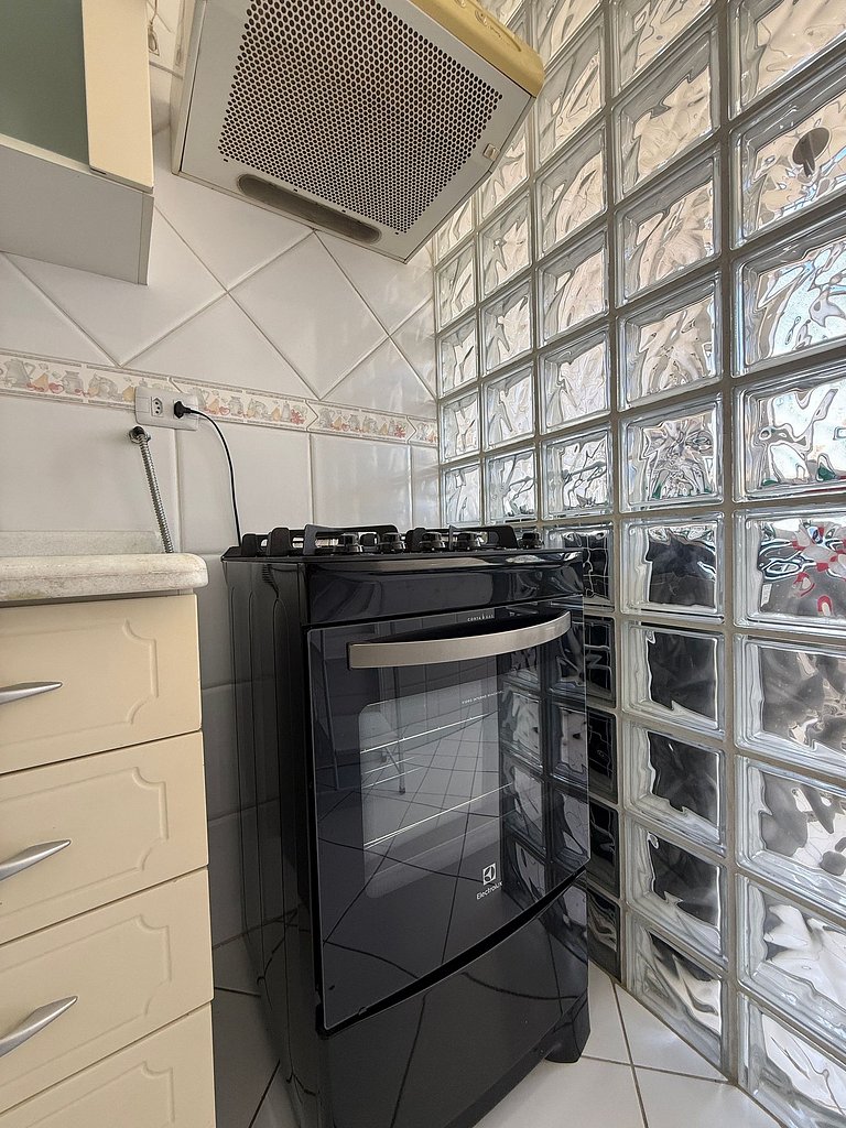 Apartamento aconchegante 0682 · 2 quartos + vaga · Shopping